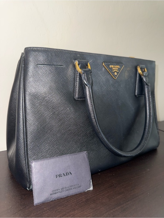 Prada Handbags - Prada Black Saffiano Leather Satchel with Gold Hardware
